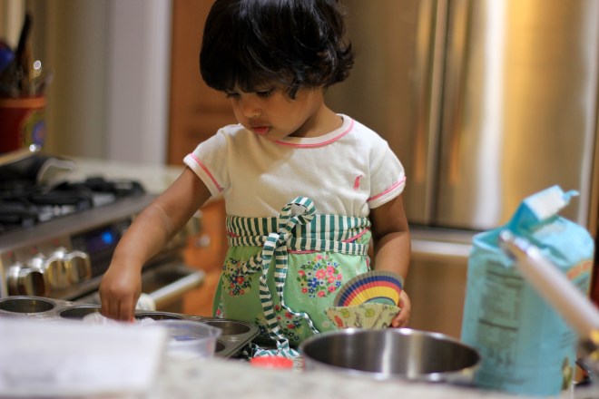 Asha baking cupcakes