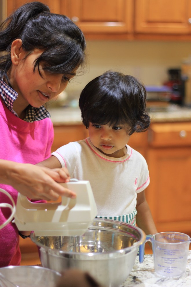 Asha baking cupcakes