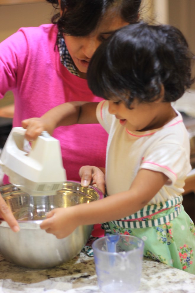 Asha baking cupcakes